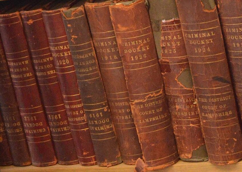 A row of old books. This file is licensed under the Creative Commons Attribution-Share Alike 4.0 International license.